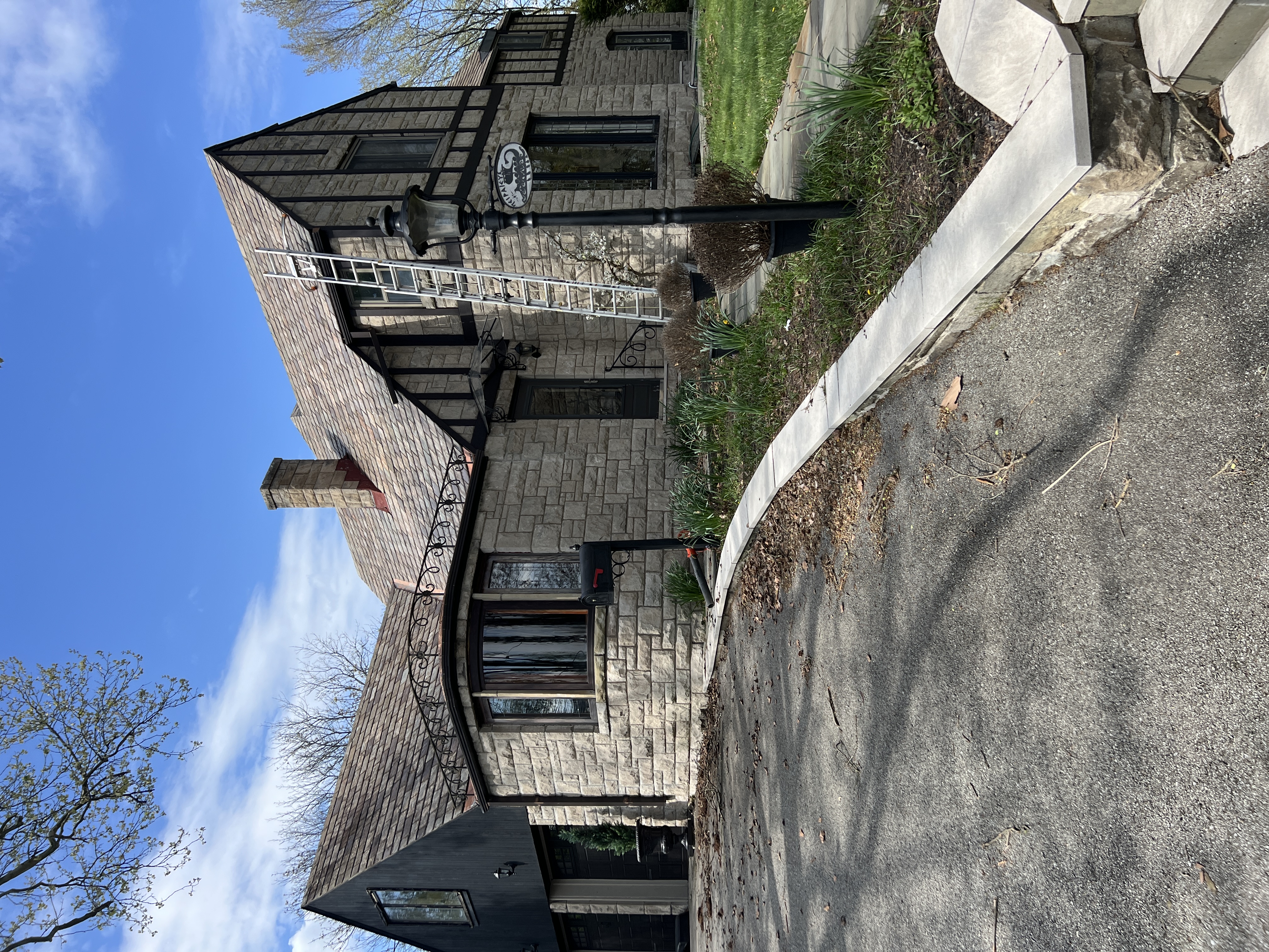 Sparkling Clean Gutters for a Beautiful Stone Home in Oakmont